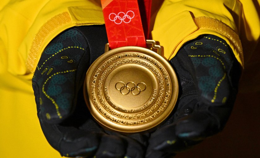 какви медали получават победителите пекин