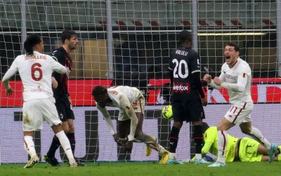Милан пропиля два гола аванс срещу Рома и изпусна да измести Ювентус от второто място
