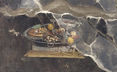 Фреска изобразяваща храна която вероятно е предшествала италианската пица беше