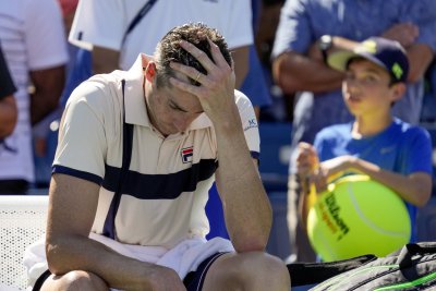 Джон Иснър отпадна от US Open и прекрати кариерата си