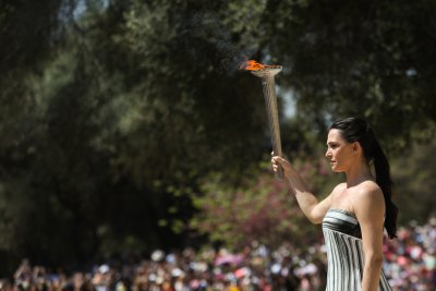 Олимпийският огън по своя път преди откриването на летните Игри