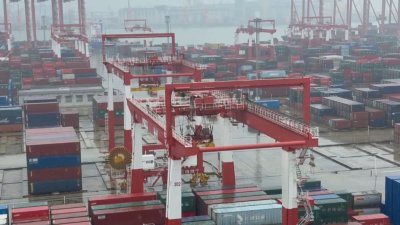 Как се товарят "мега корабите" на интелигентните пристанища в Китай?
