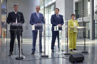 Германските консерватори и социалдемократи постигнаха принципно съгласие за правителство а