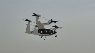 С 320 км/ч: Първи успешен тест с електрическо такси в небето над Дубай (СНИМКИ)