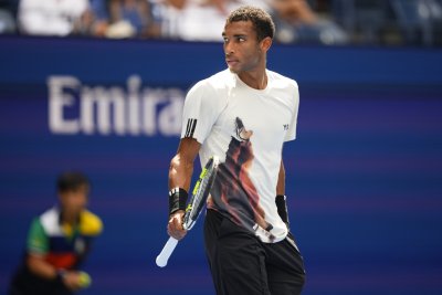 Феликс Оже-Алиасим продължава към полуфиналите на US Open след успех над Алекс Де Минор