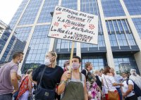 Протести в Мадрид и Брюксел срещу задължителното носене на маски