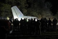 снимка 3 Самолет се разби край Харков, десетки загинаха (Снимки)