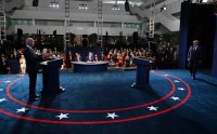 снимка 22 Първият дебат Тръмп - Байдън: Остри реплики, обиди и престрелки с водещия (СНИМКИ)
