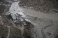 снимка 2 Бедствие в Индия - водна стена от ледник отнесе села и пътища (видео)