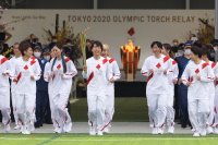снимка 3 Запалиха Олимпийския огън за игрите в Токио (Снимки)