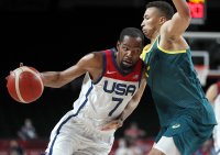 Баскетболистите на САЩ обърнаха Австралия и очакват съперника си за титлата