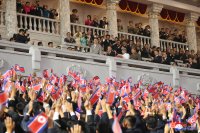 снимка 3 Хиляди в защитно облекло излязоха на военен парад в Северна Корея (Снимки)