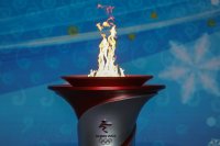 Олимпийският огън пристигна в Китай (Снимки)