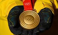 Какви медали получават победителите в Пекин?