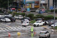 снимка 4 Порой потопи Сеул - 7 души загинаха, други 7 са в неизвестност