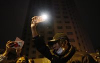 снимка 3 Протестите в Китай се разрастват: Граждани протестират срещу Си Цзинпин и ковид политиката
