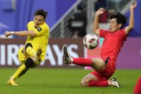 Малайзия записа първа точка на турнира за Купата на Азия и отне първото място в група Е от Южна Корея