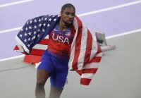 снимка 4 Ноа Лайлс триумфира със златото на 100 метра на Игрите в Париж