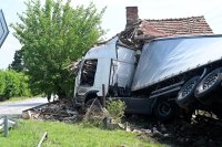 Lorry Crashes Through Crash Barrier and Slams Into House in North-Western Bulgaria (photos)